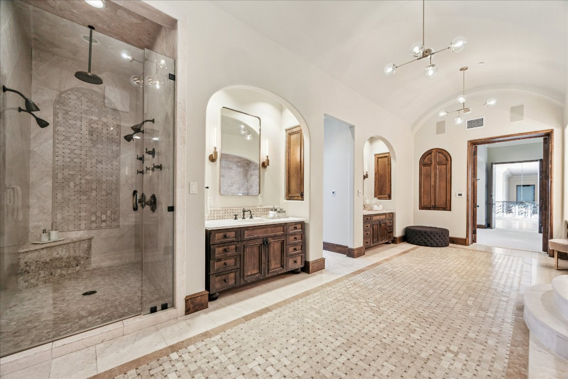 9 Rue Boerne, TX 78006 - Photo 29 of 50 a large spacious bathroom with a granite countertop sink mirror and shower