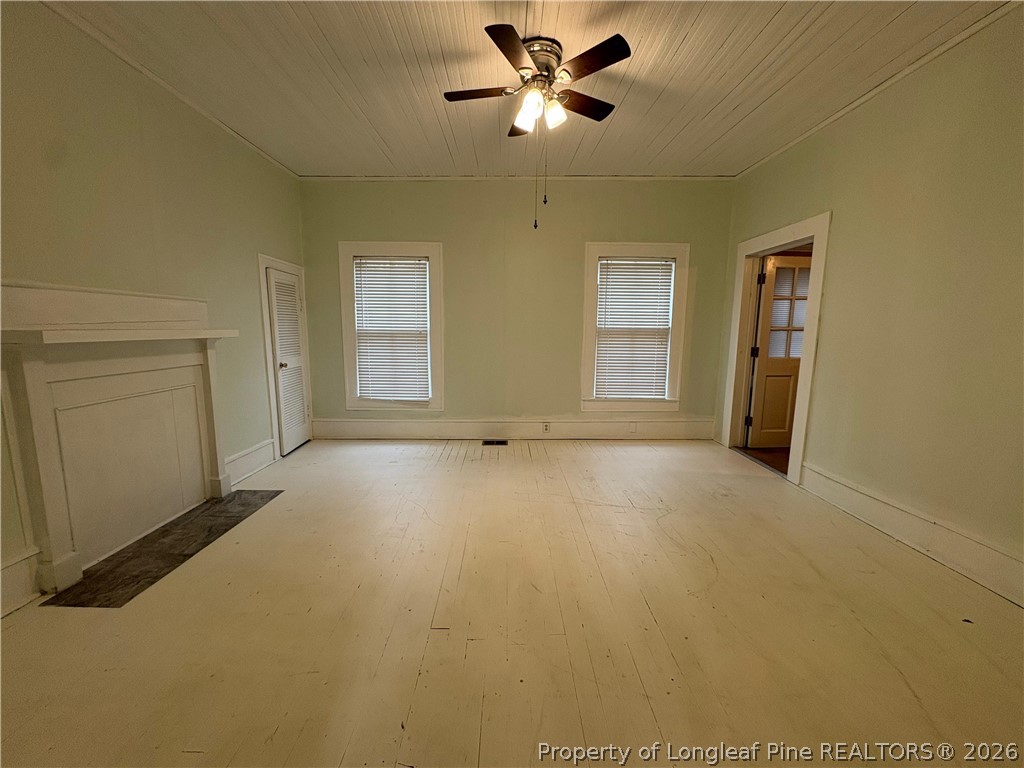 3174 Lindsay Road Raeford, NC 28376 - Photo 11 of 28 a view of a livingroom with a ceiling fan and window
