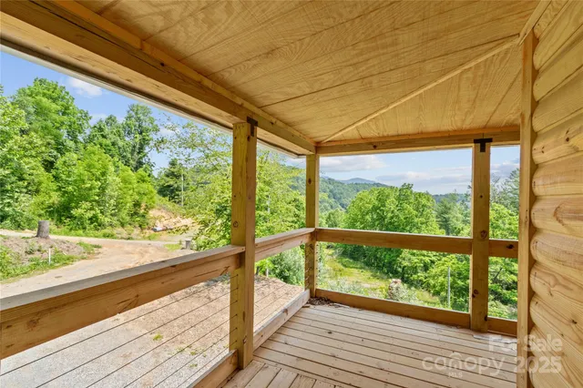 a view of a hallway with seating area
