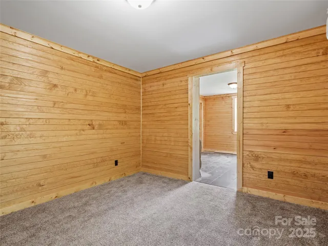 a view of livingroom with furniture and natural light