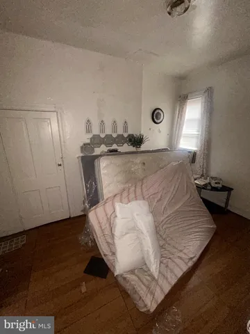 a living room with a bed