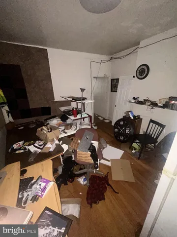 a room with furniture and a flat screen tv