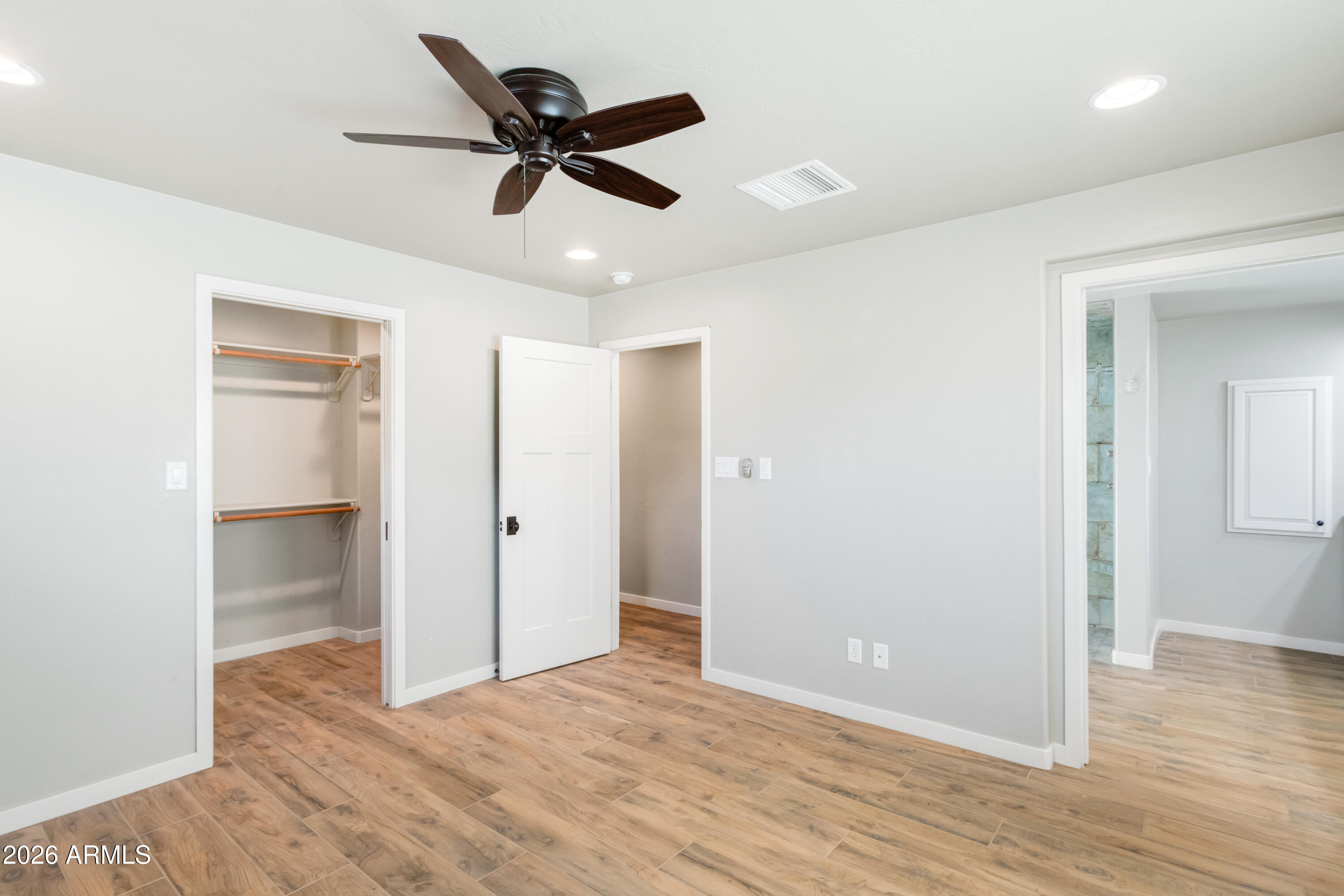 5306 East Spring Road Hereford, AZ 85615 - Photo 27 of 61 a view of empty room with wooden floor