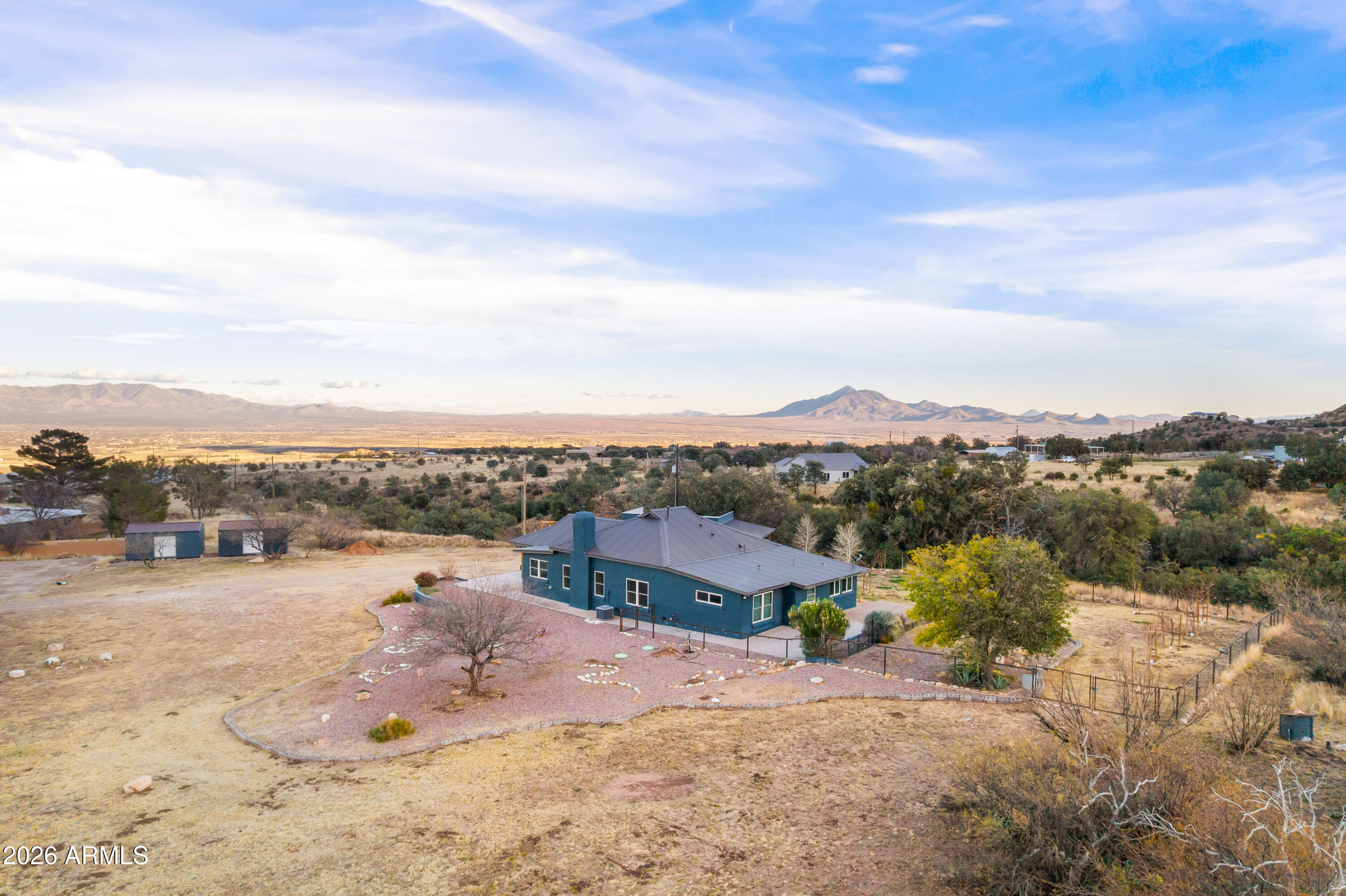 5306 East Spring Road Hereford, AZ 85615 - Photo 55 of 61 a view of a lake with a mountain