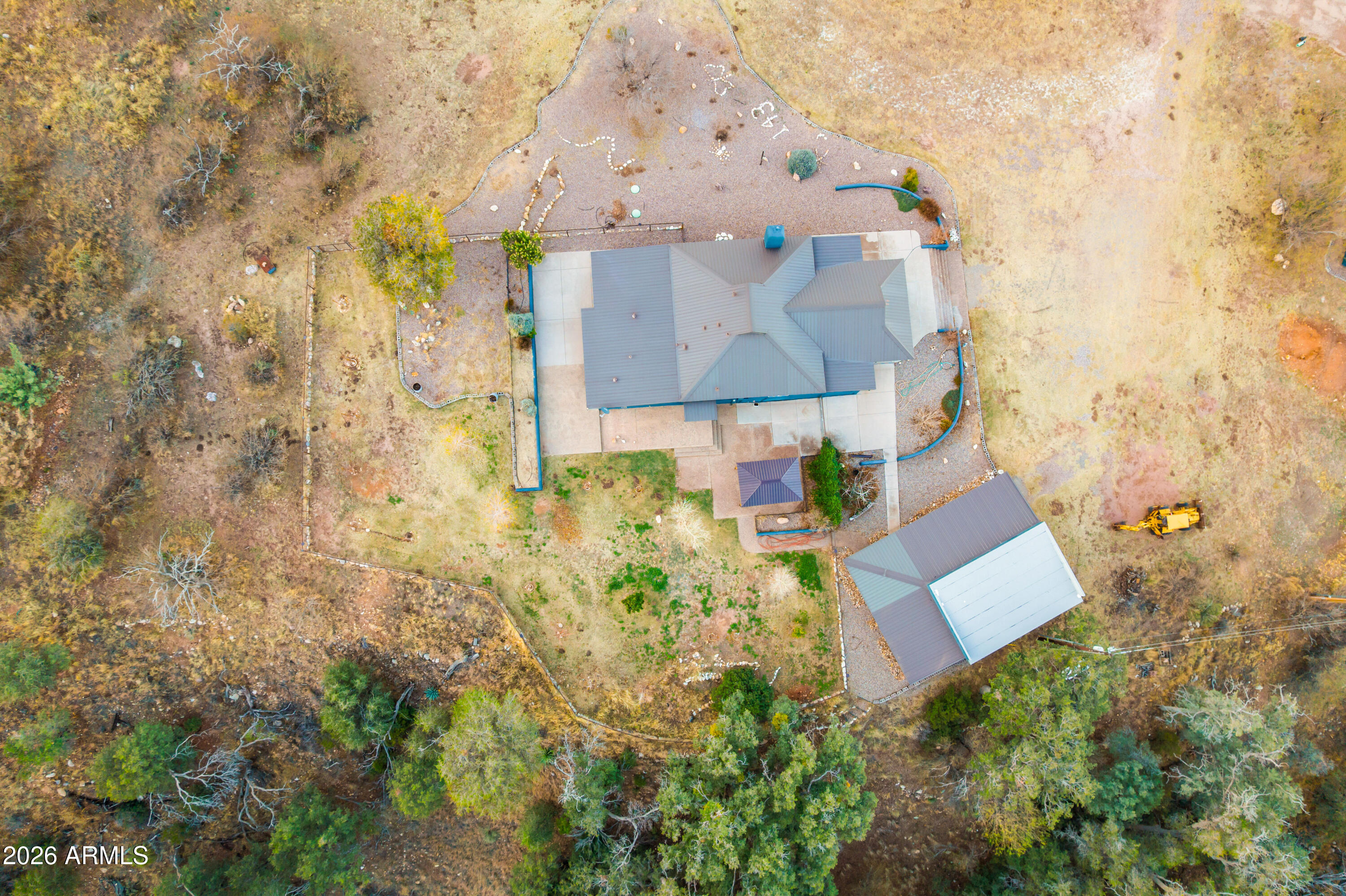 5306 East Spring Road Hereford, AZ 85615 - Photo 58 of 61 aerial view of a house with a yard and trees