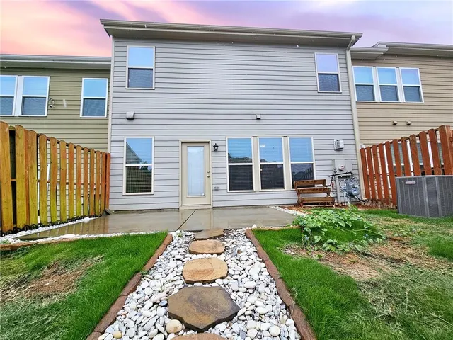 a view of a house with a garden