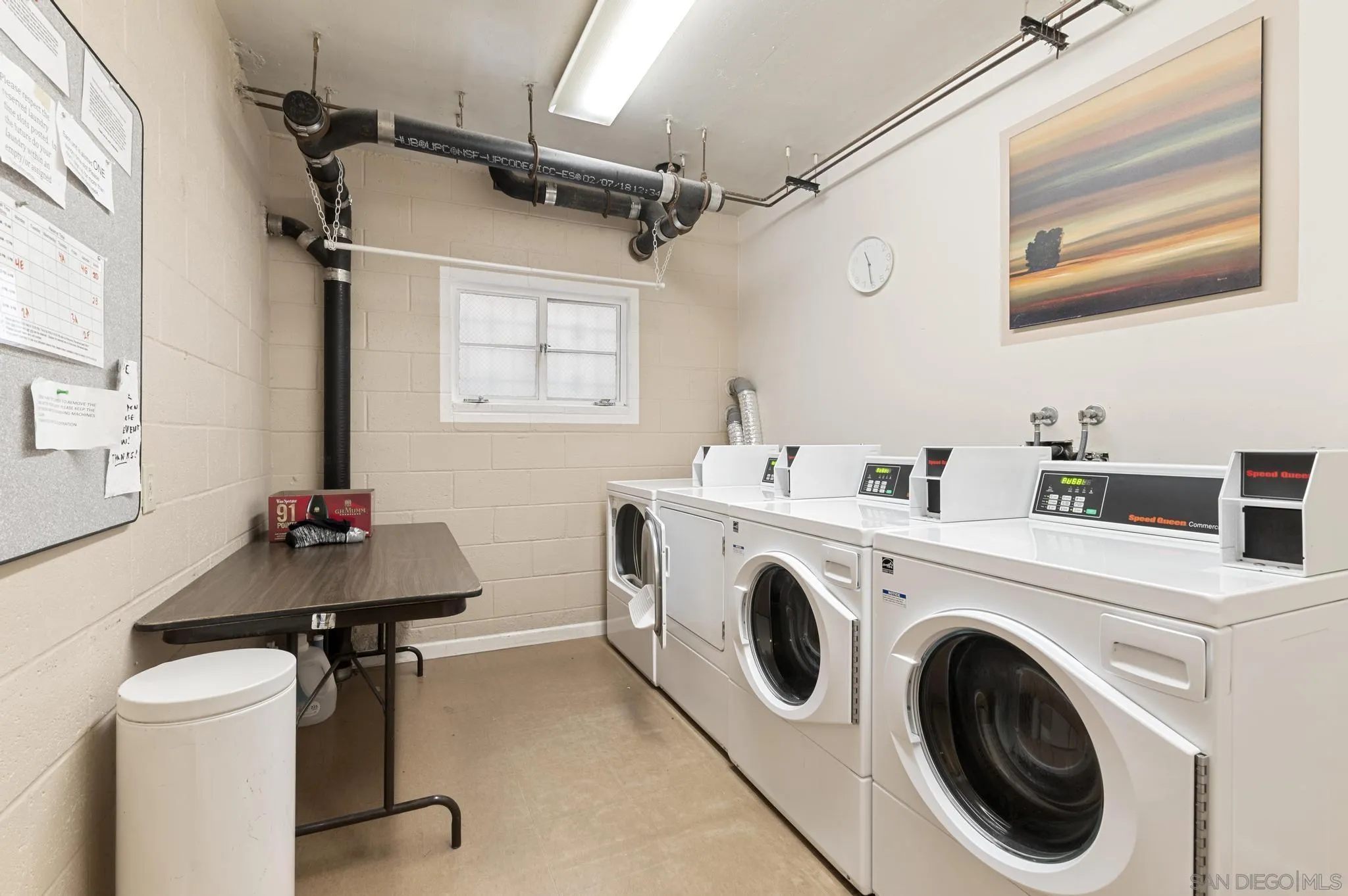 140 Walnut Avenue, Unit 2A San Diego, CA 92103 - Photo 17 of 22 a utility room with dryer and washer