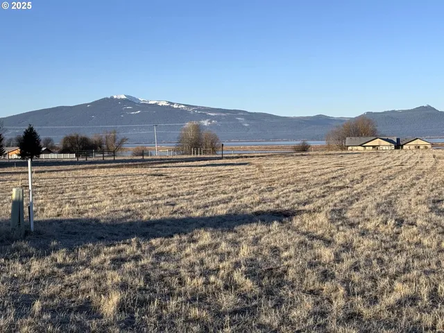 a view of ocean and mountain