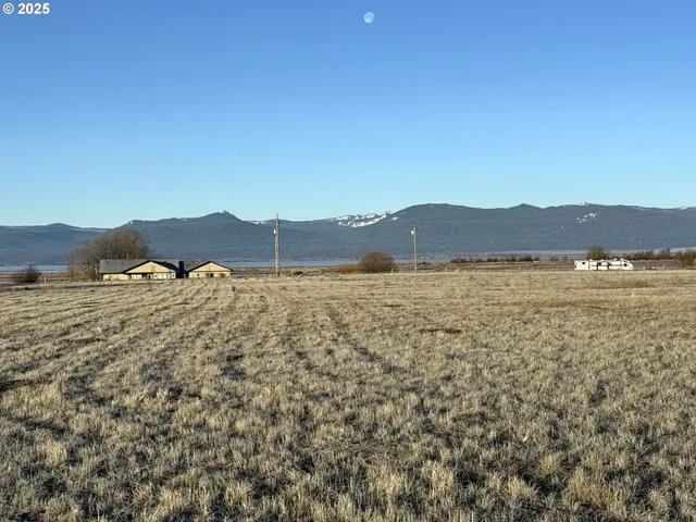 a view of a large body of water and mountain view