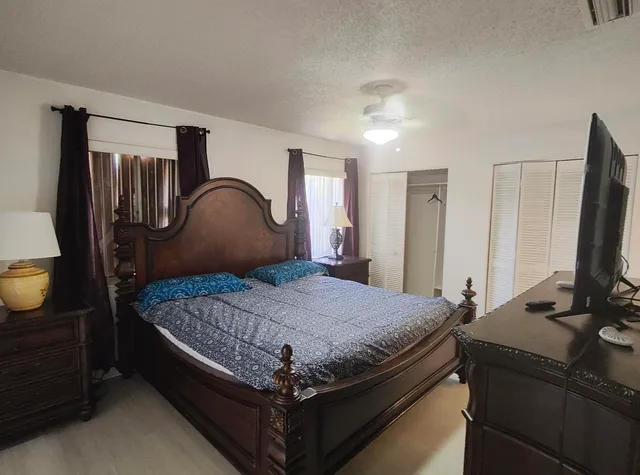 a view of a room with furniture and a livingroom