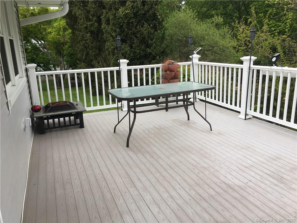 17 Cottontail Road Norwalk, CT 06854 - Photo 9 of 10 a view of a wooden bench on the deck