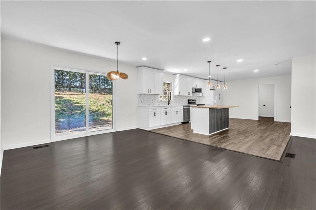 2401 Winshire Drive Decatur, GA 30035 - Photo 20 of 35 a view of kitchen with cabinets and wooden floor