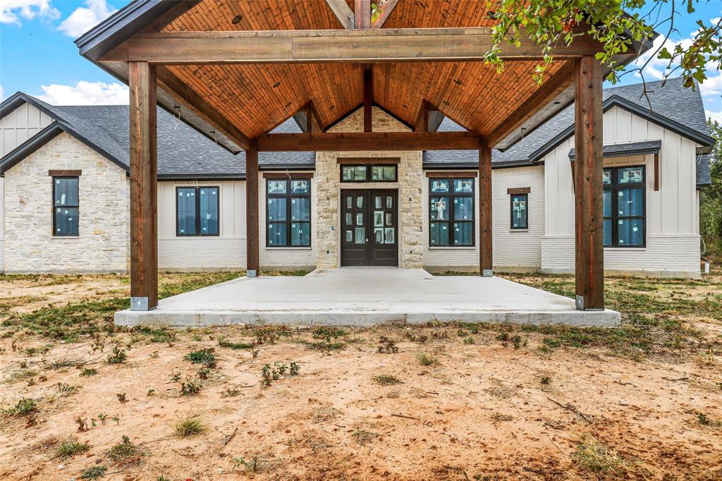 4018 Ken Road Tolar, TX 76476 - Photo 3 of 40 a view of a house with a porch