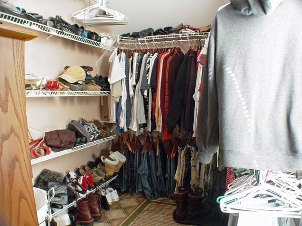 384 Anthony Street Fall River, MA 02721 - Photo 23 of 26 a view of walk in closet with clothes and shoes