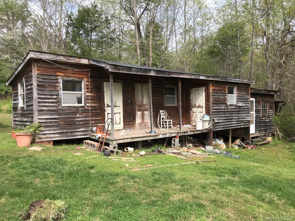 303 Hollifield Road Bostic, NC 28018 - Photo 6 of 13 a front view of a house with a yard