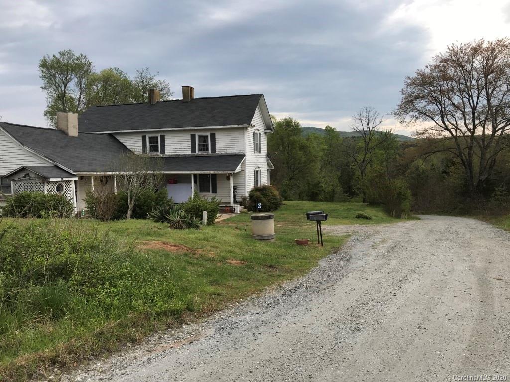 303 Hollifield Road Bostic, NC 28018 - Photo 7 of 13 a front view of a house with garden