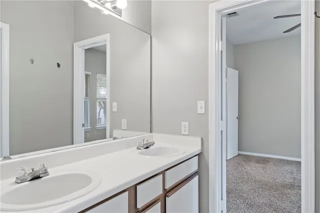 a bathroom with a toilet and a bathtub