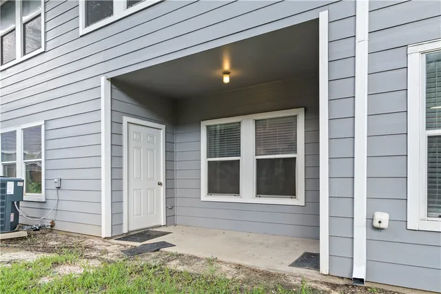 front view of a house with a street
