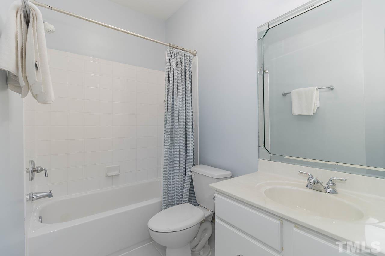 12507 Megan Hill Court Raleigh, NC 27614 - Photo 23 of 39 a bathroom with a sink toilet and shower