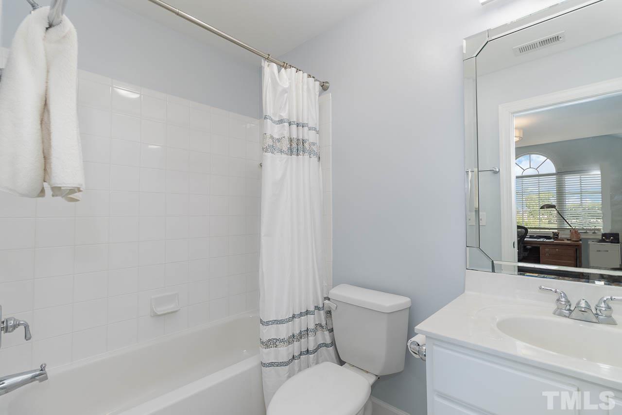 12507 Megan Hill Court Raleigh, NC 27614 - Photo 25 of 39 a bathroom with a sink toilet and shower