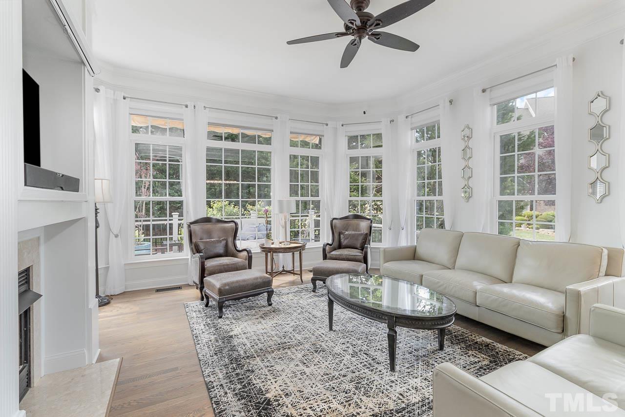 12507 Megan Hill Court Raleigh, NC 27614 - Photo 4 of 39 a living room with furniture and a large window