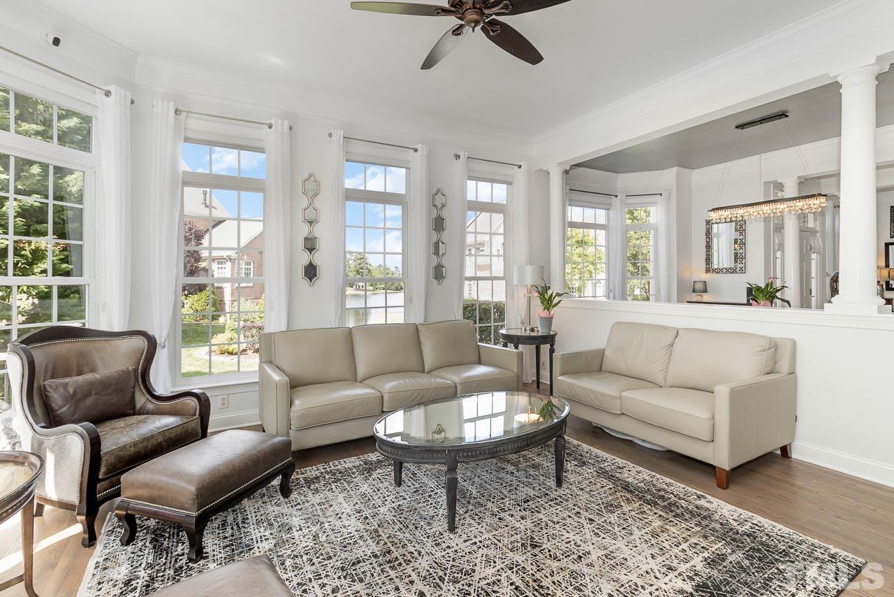 12507 Megan Hill Court Raleigh, NC 27614 - Photo 5 of 39 a living room with furniture and a large window