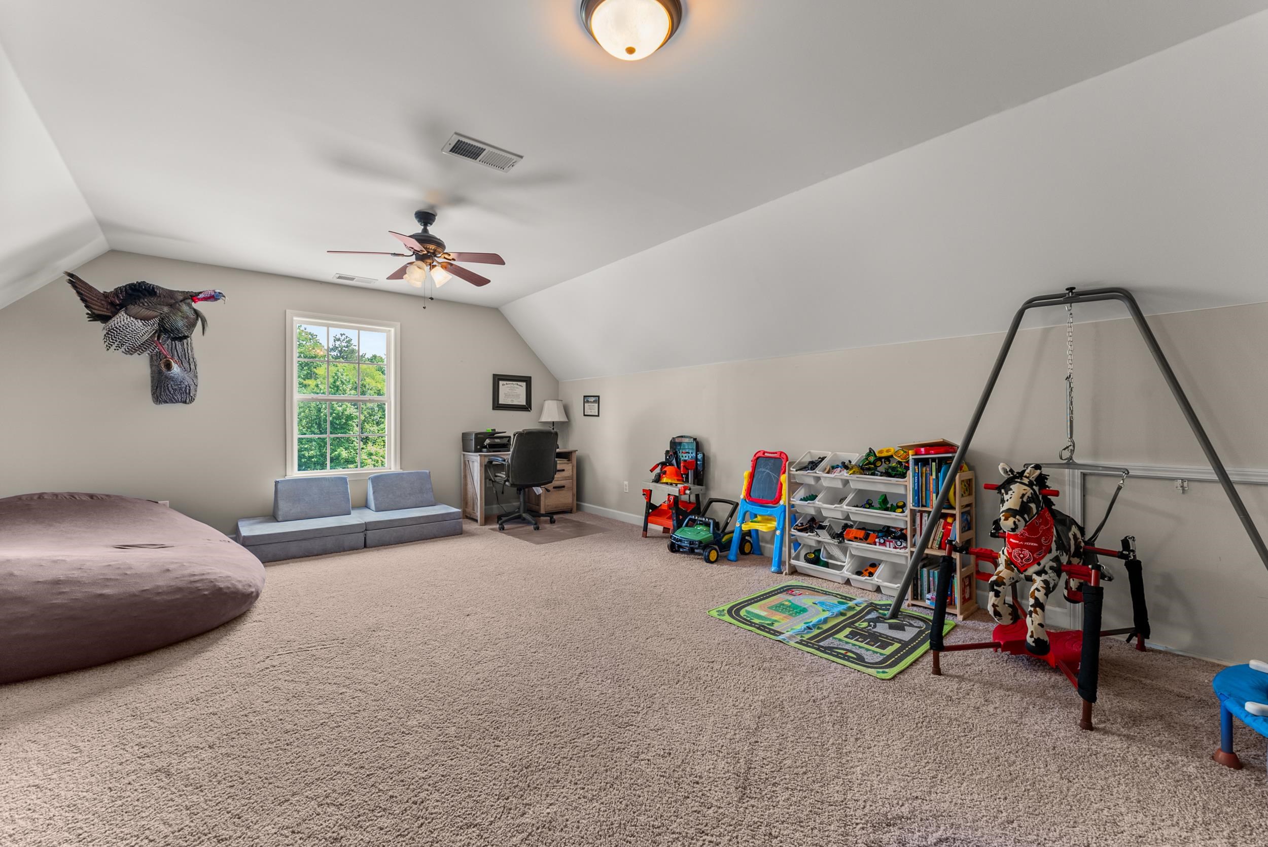 6415 Lagrange Road Somerville, TN 38068 - Photo 27 of 32 Recreation room featuring lofted ceiling, carpet floors, a ceiling fan, a desk, and baseboards