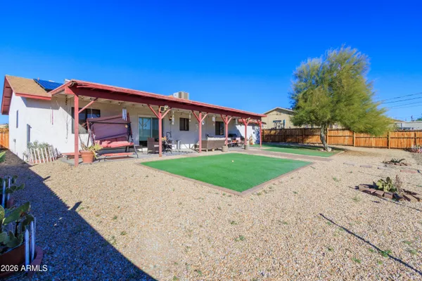 a view of a house with a big yard