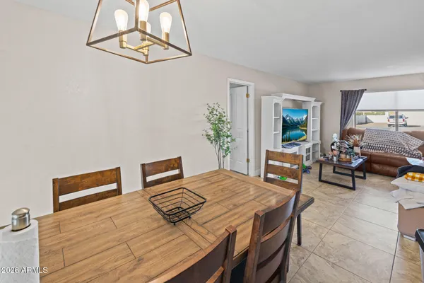 a kitchen with cabinets appliances and a sink