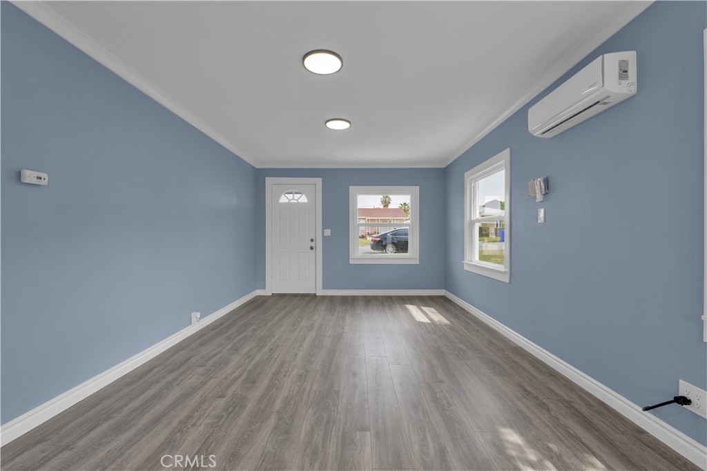 34945 Ave B Yucaipa, CA 92399 - Photo 11 of 69 wooden floor in an empty room with a window