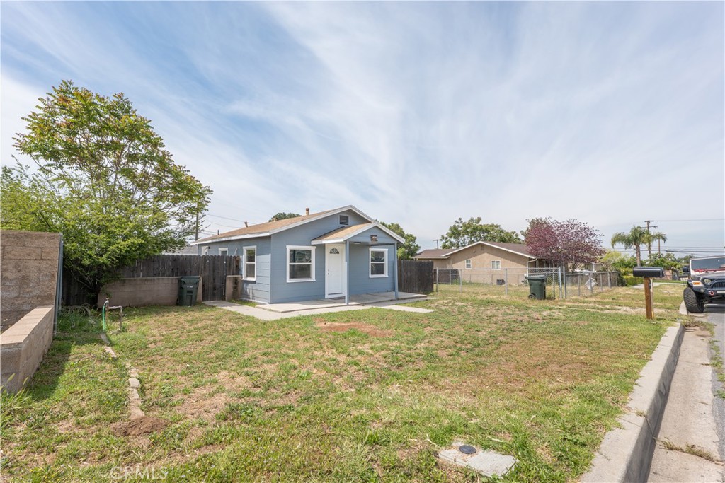 34945 Ave B Yucaipa, CA 92399 - Photo 29 of 69 a large house with a big yard and large trees