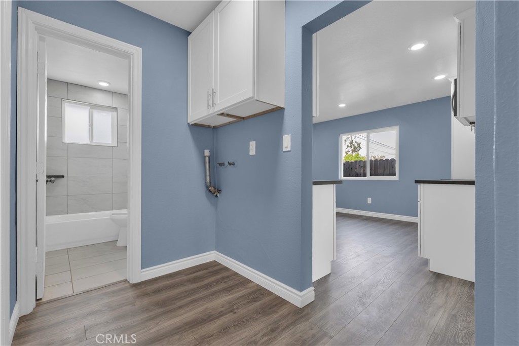 34945 Ave B Yucaipa, CA 92399 - Photo 41 of 69 an empty room with wooden floor and windows