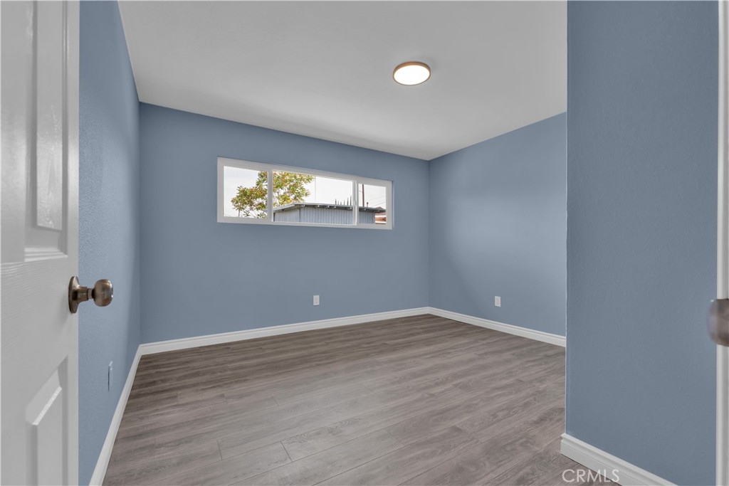 34945 Ave B Yucaipa, CA 92399 - Photo 48 of 69 wooden floor in an empty room with a window