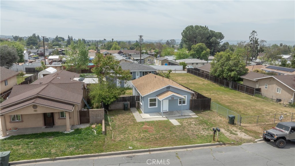 34945 Ave B Yucaipa, CA 92399 - Photo 55 of 69 a view of a house with a yard