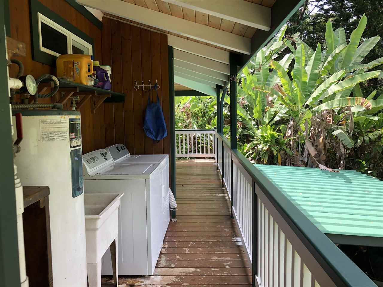 19 Door Of Faith Road Haiku, HI 96708 - Photo 20 of 30 a pathway of a house with a yard