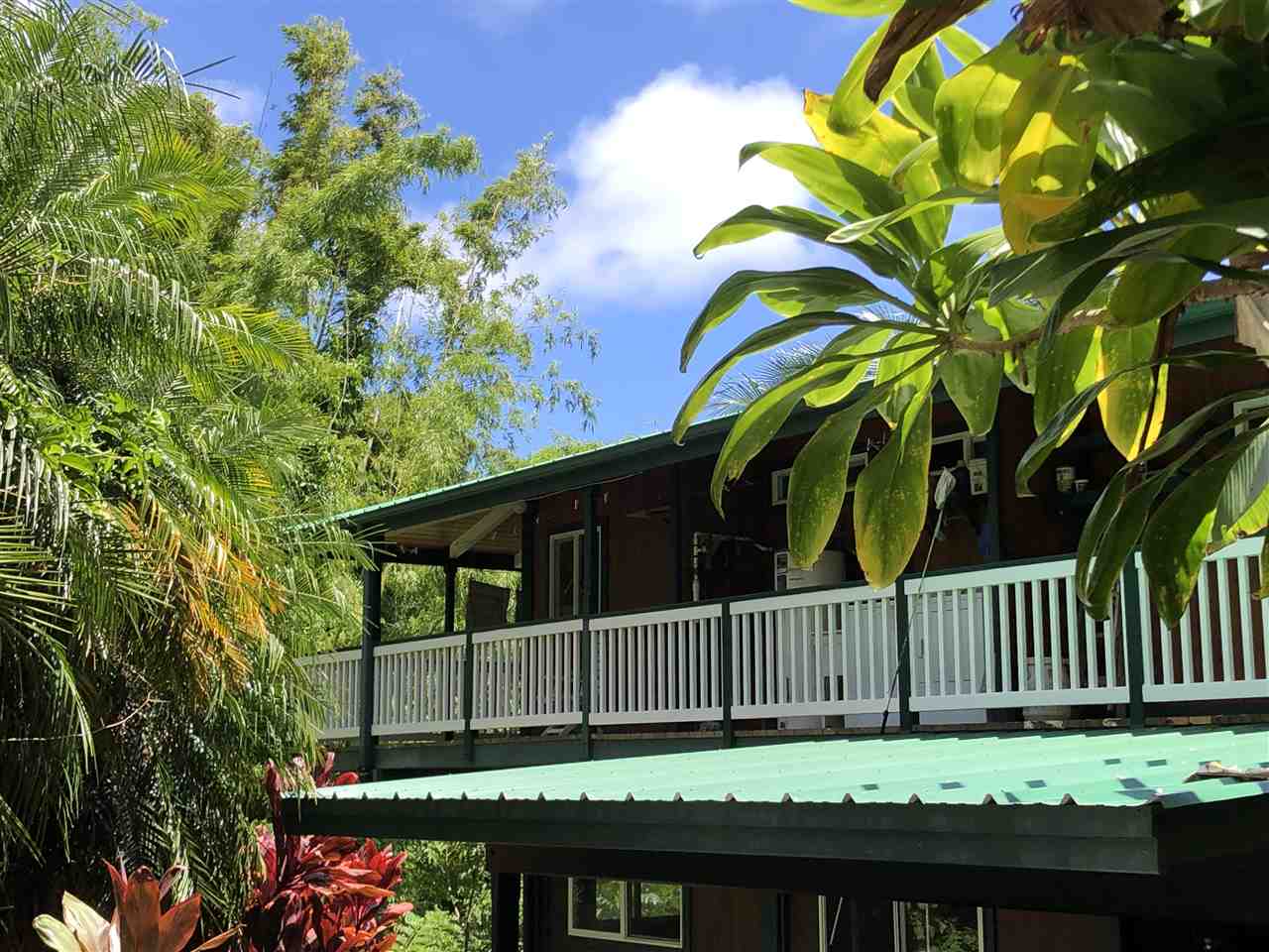 19 Door Of Faith Road Haiku, HI 96708 - Photo 4 of 30 a view of a house with a small yard