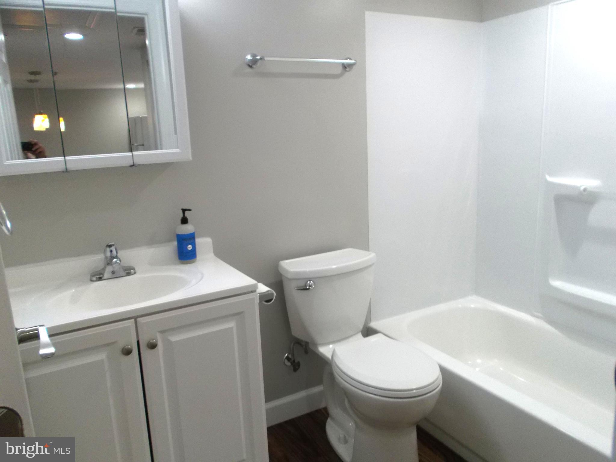 278 Ridge Road Browns Mills, NJ 08015 - Photo 16 of 22 a bathroom with a sink toilet and shower