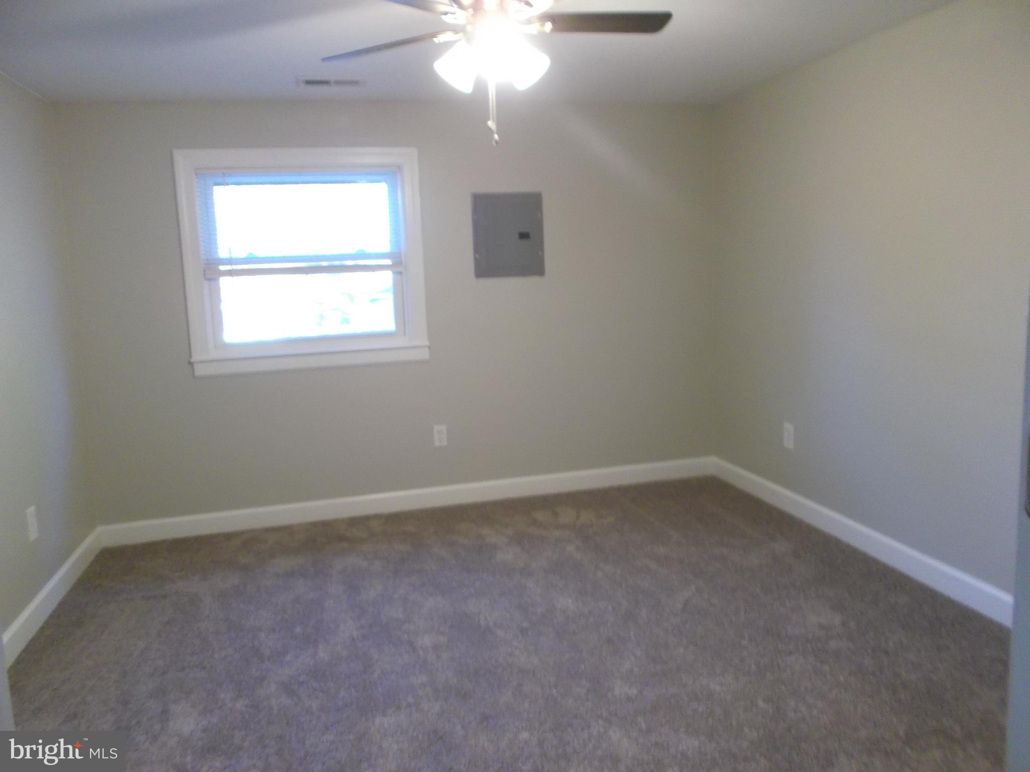 278 Ridge Road Browns Mills, NJ 08015 - Photo 18 of 22 an empty room with a window