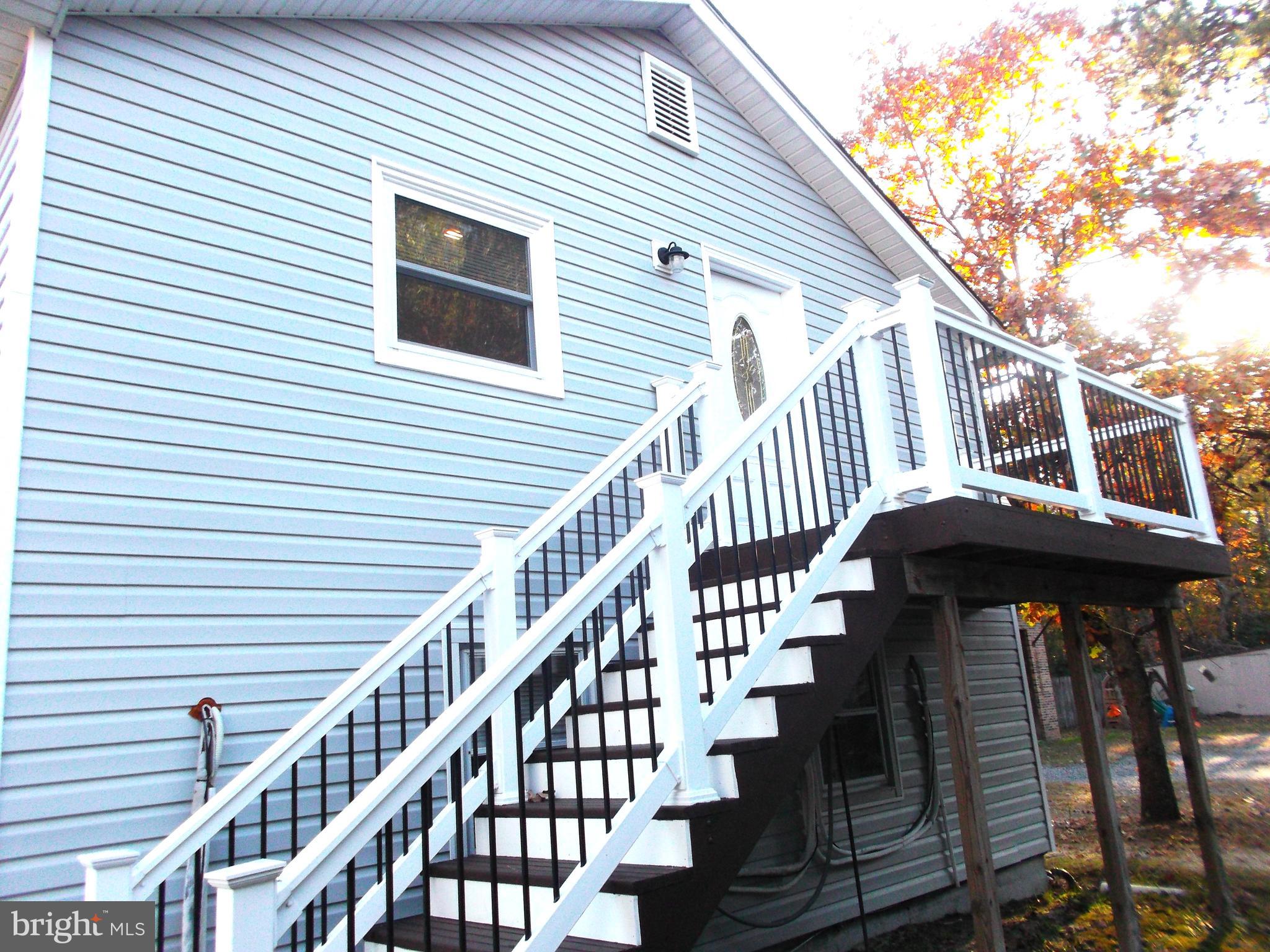 278 Ridge Road Browns Mills, NJ 08015 - Photo 2 of 22 a view of entryway with a balcony