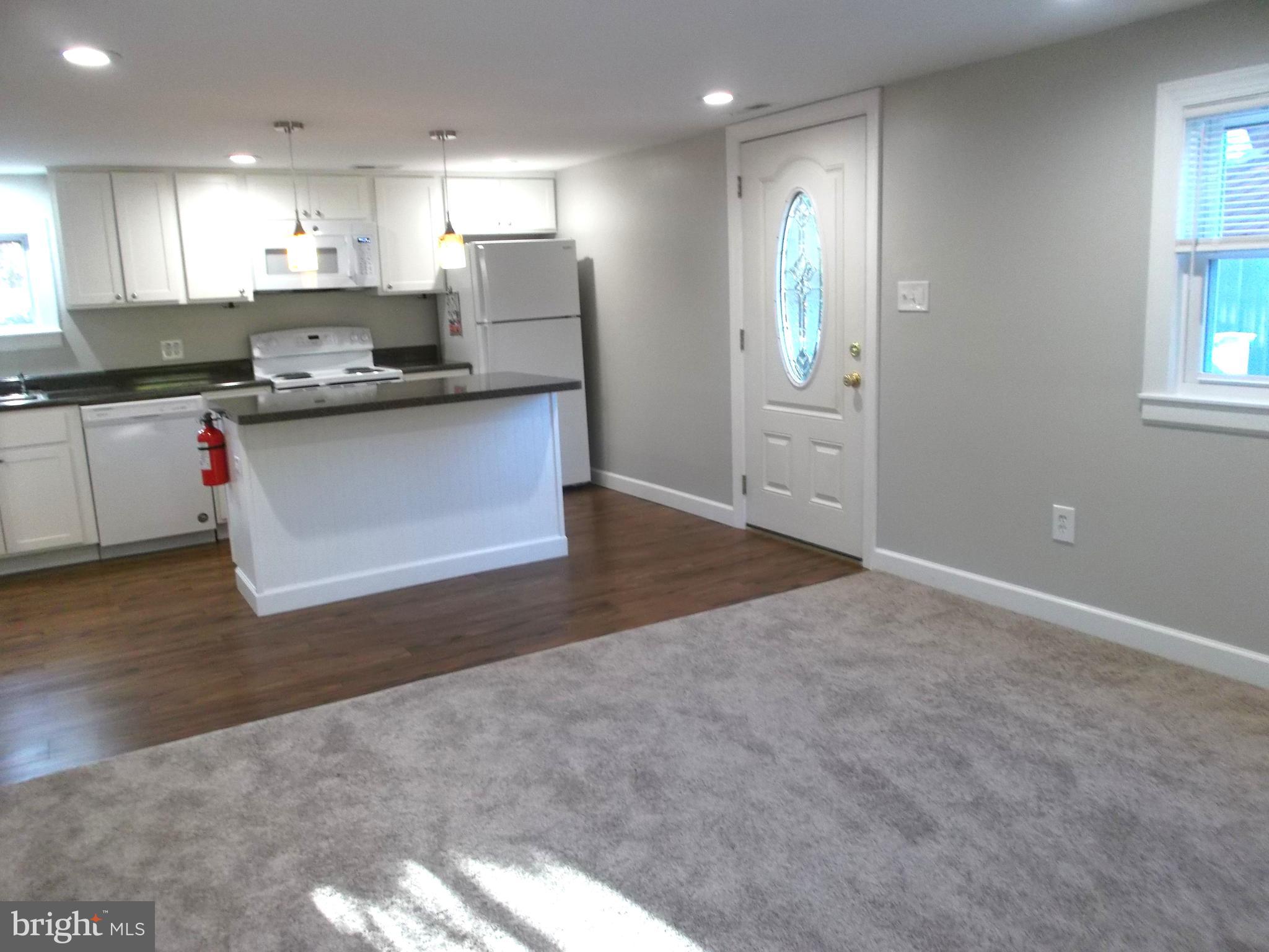 278 Ridge Road Browns Mills, NJ 08015 - Photo 9 of 22 a kitchen with stainless steel appliances granite countertop a refrigerator and a stove