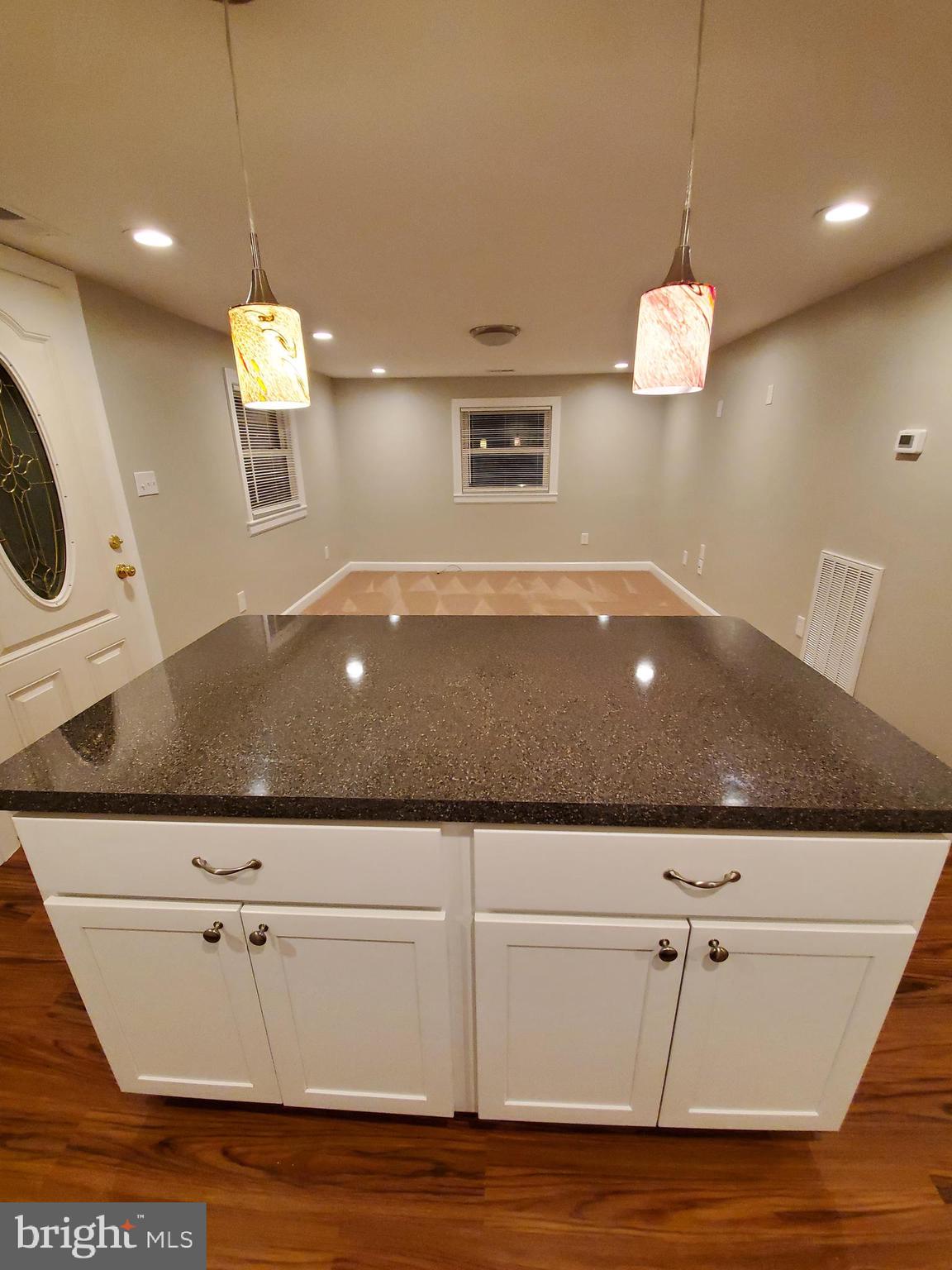 278 Ridge Road Browns Mills, NJ 08015 - Photo 10 of 22 a view of a room with wooden floor and ceiling fan