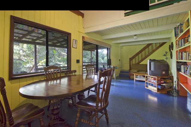 40 Kapuai Road Haiku, HI 96708 - Photo 25 of 29 a dining room with furniture and wooden floor