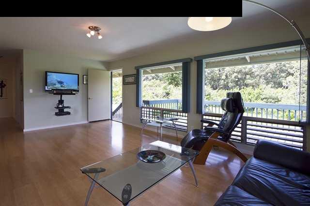 40 Kapuai Road Haiku, HI 96708 - Photo 5 of 29 a living room with furniture and a large window