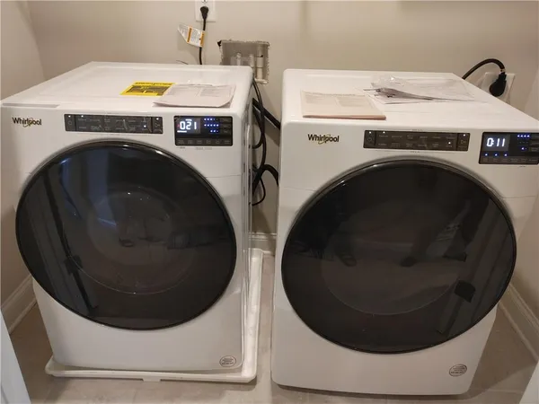 a utility room with dryer and washer
