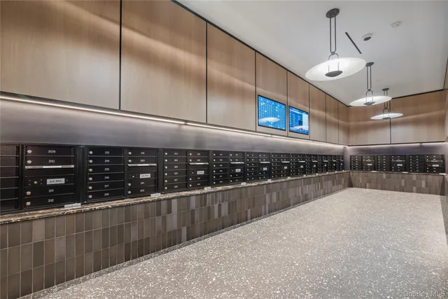 a view of a refrigerator in kitchen and wooden floor