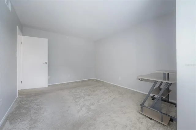 a bathroom with a sink toilet and a mirror