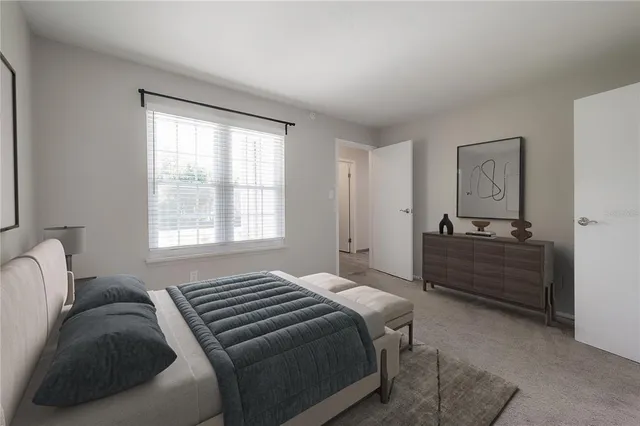 a bathroom with a sink toilet and a mirror