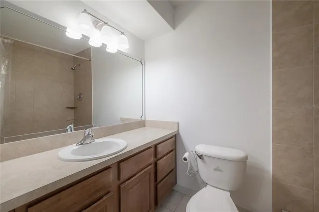 a view of a balcony with yard