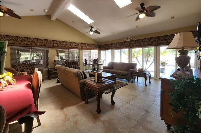 a view of swimming pool with outdoor seating and yard