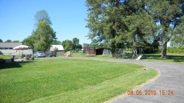 86 Sears Roebuck Road Tullahoma, TN 37388 - Photo 14 of 16 This property also includes a shed. It has a chain-linked fenced for dogs, if needed.